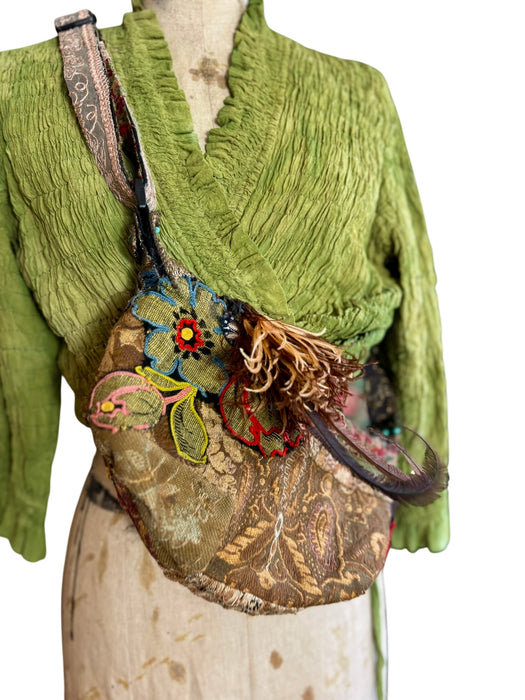 Omnia, reworked 80s half moon cross body bag