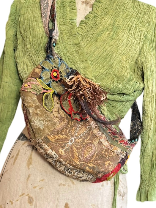 Omnia, reworked 80s half moon cross body bag