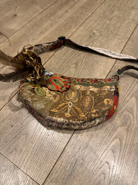 Omnia, reworked 80s half moon cross body bag