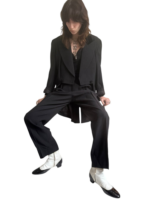 Wade, 70s black wool pleated trousers and tail jacket