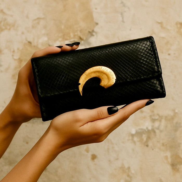 Jasmir, handmade black snake skin clutch with vintage clasp