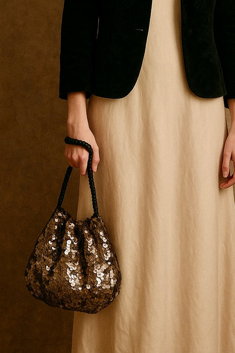 Aida, 20s gold sequence and black cord bucket handbag