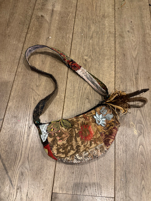 Omnia, reworked 80s half moon cross body bag