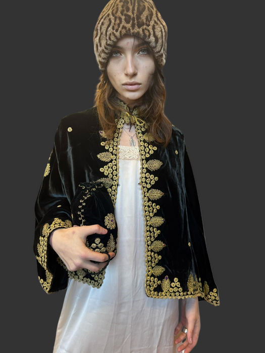 Erin, 30s leopard print hat with large leather button