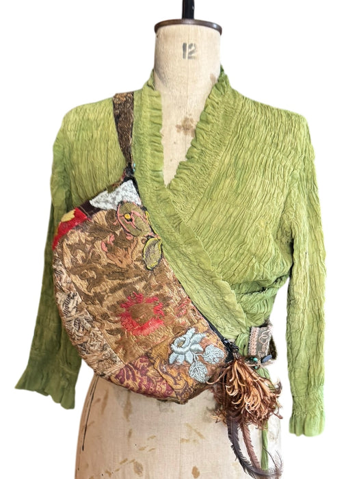 Omnia, reworked 80s half moon cross body bag