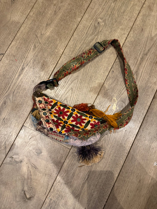 Omnia, reworked 80s half moon cross body bag