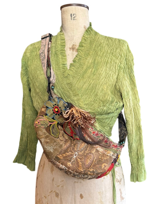 Omnia, reworked 80s half moon cross body bag