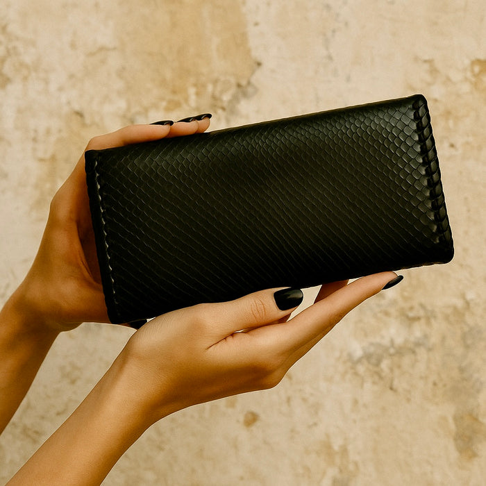 Jasmir, handmade black snake skin clutch with vintage clasp