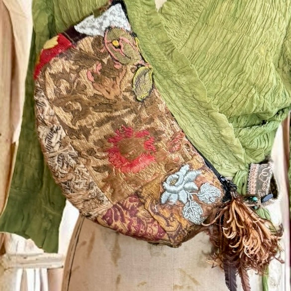 Omnia, reworked 80s half moon cross body bag