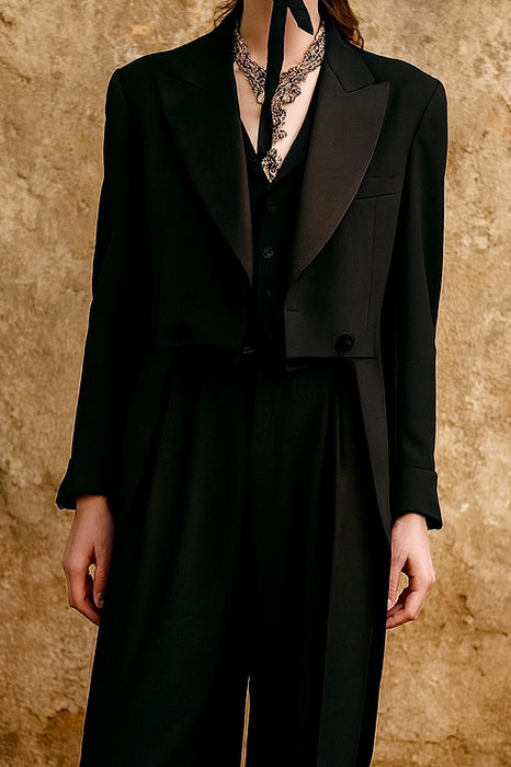 Wade, 70s black wool pleated trousers and tail jacket