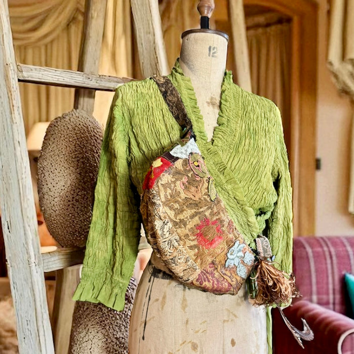 Omnia, reworked 80s half moon cross body bag