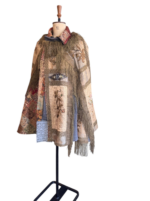 Adonis, reworked rare 20th C silk, lace and metallic fringe cape