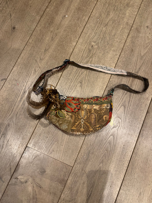 Omnia, reworked 80s half moon cross body bag