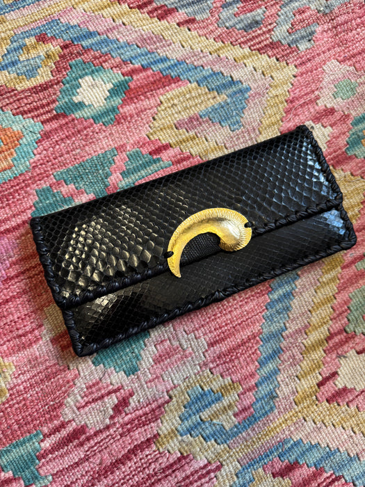 Jasmir, handmade black snake skin clutch with vintage clasp