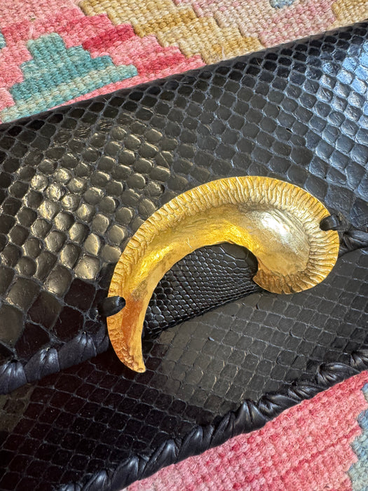 Jasmir, handmade black snake skin clutch with vintage clasp