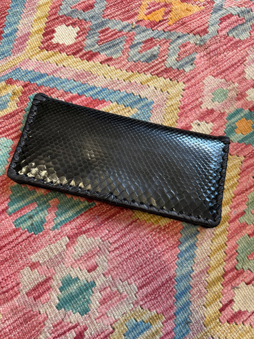 Jasmir, handmade black snake skin clutch with vintage clasp