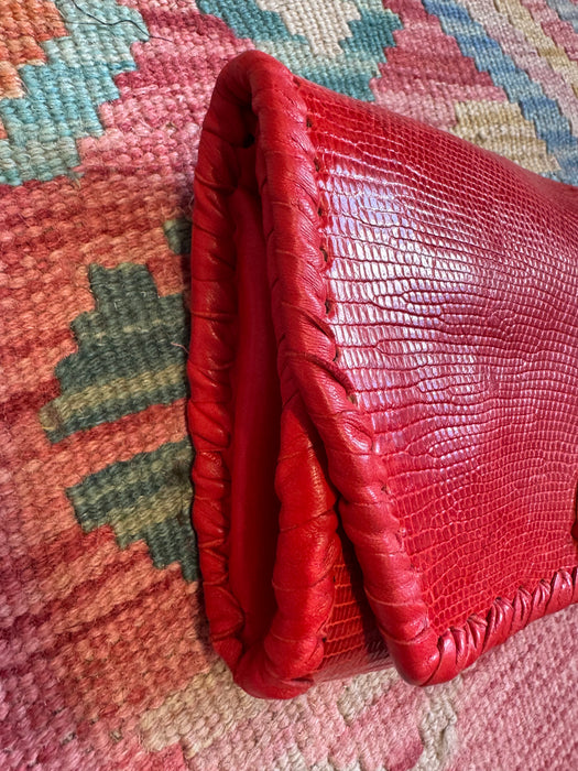 Jasmir, handmade red lizard skin clutch with a sculptural 70s clasp