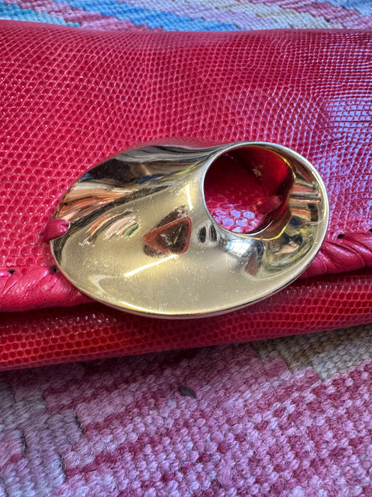 Jasmir, handmade red lizard skin clutch with a sculptural 70s clasp