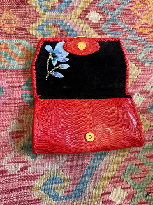 Jasmir, handmade red lizard skin clutch with a sculptural 70s clasp
