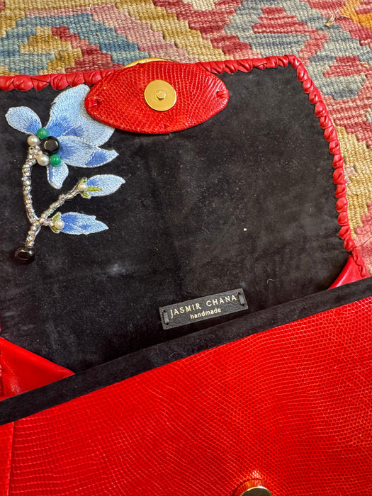 Jasmir, handmade red lizard skin clutch with a sculptural 70s clasp