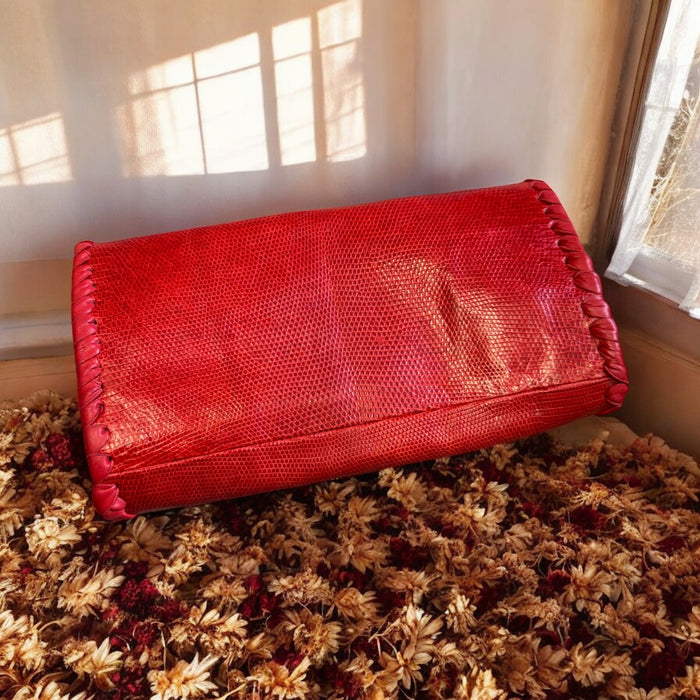 Jasmir, handmade red lizard skin clutch with a sculptural 70s clasp