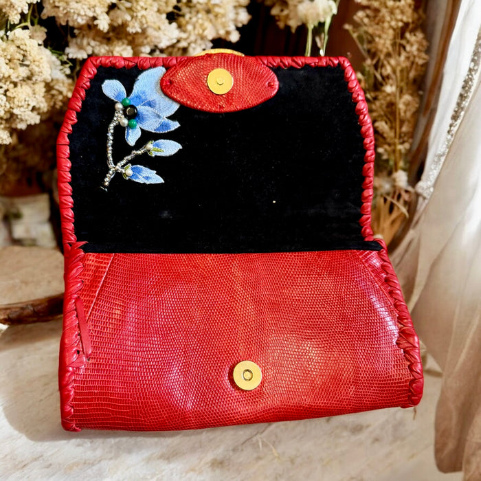 Jasmir, handmade red lizard skin clutch with a sculptural 70s clasp