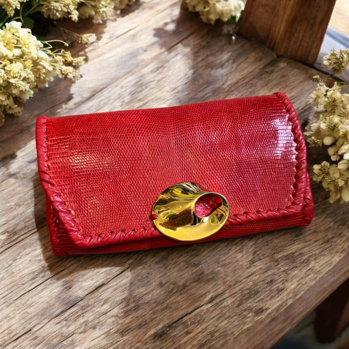 Jasmir, handmade red lizard skin clutch with a sculptural 70s clasp