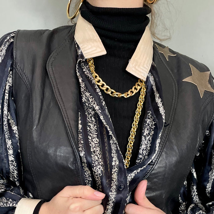 Clothilde, 70s leather black waistcoat with butterfly applique