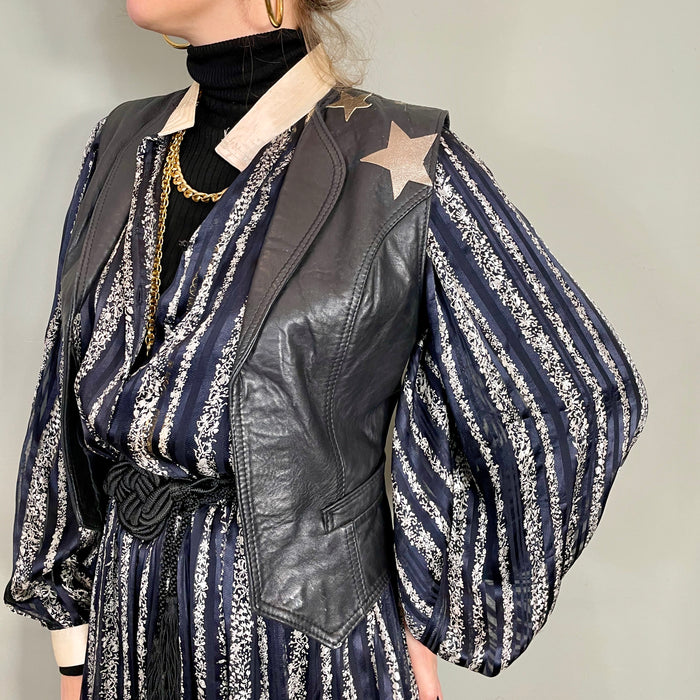 Clothilde, 70s leather black waistcoat with butterfly applique