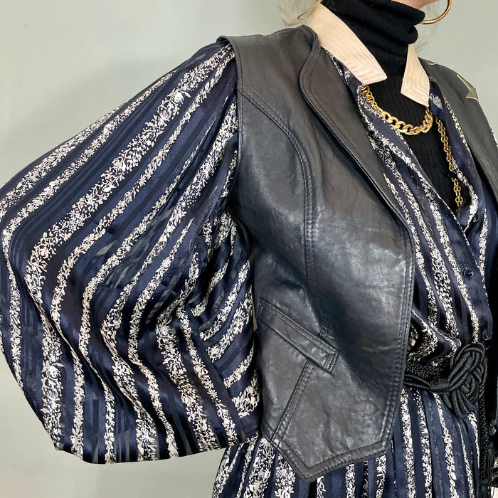 Clothilde, 70s leather black waistcoat with butterfly applique