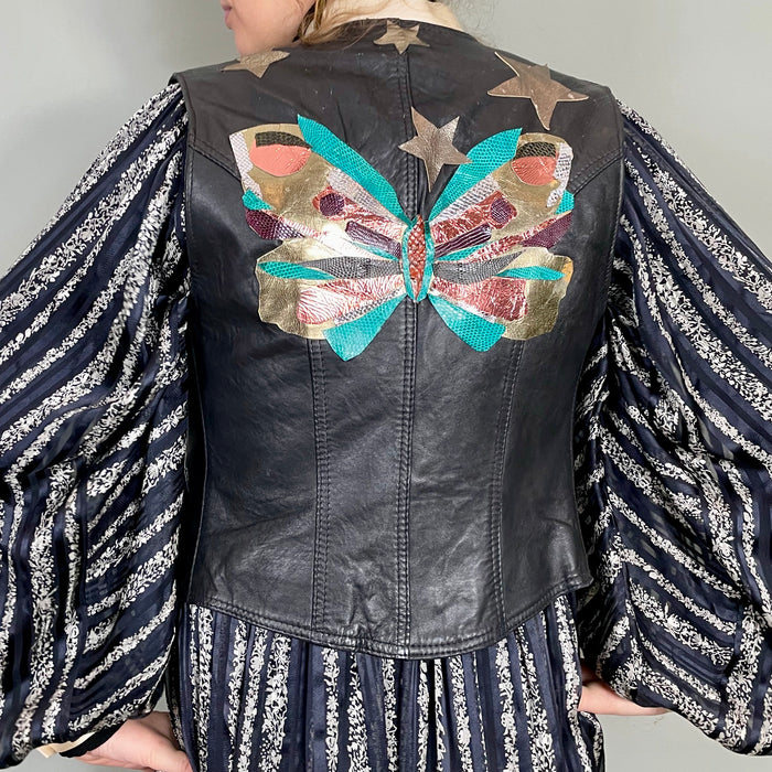 Clothilde, 70s leather black waistcoat with butterfly applique
