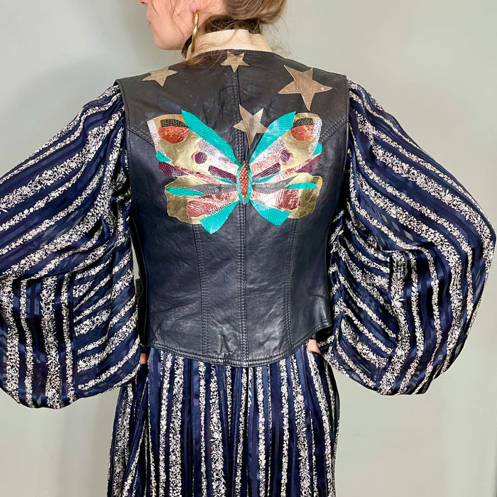 Clothilde, 70s leather black waistcoat with butterfly applique