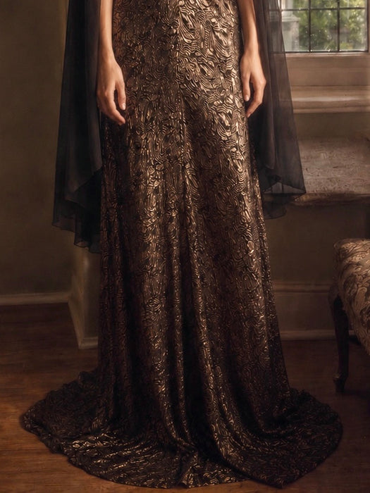 Freja, 1930s black and gold lamé gown with chiffon angel sleeves