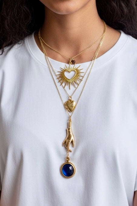 Ash, vintage 14c gold heart burst and droplet on a gold 14c chain