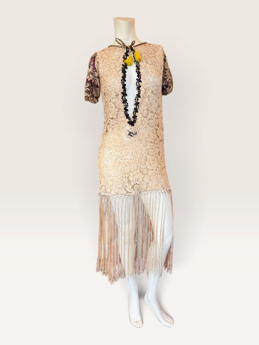 Odette, reworked 1940s cream lace fringed mini dress with 20s black jet beaded keyhole design.