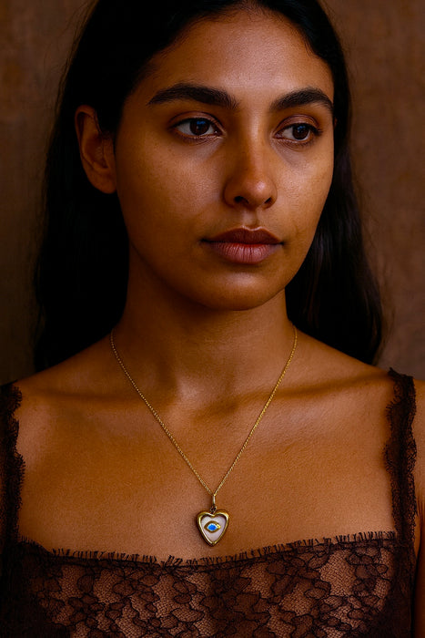Erin, vintage heart shape ceramic eye charm and 14 c gold pendant and chain