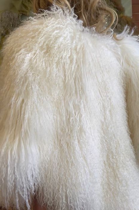 Magnolia, 80s Mongolian fur cream cape with 3 leather ties