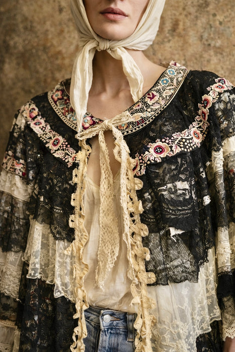 Moldova, reworked antique lace and embroidered ribbon coat