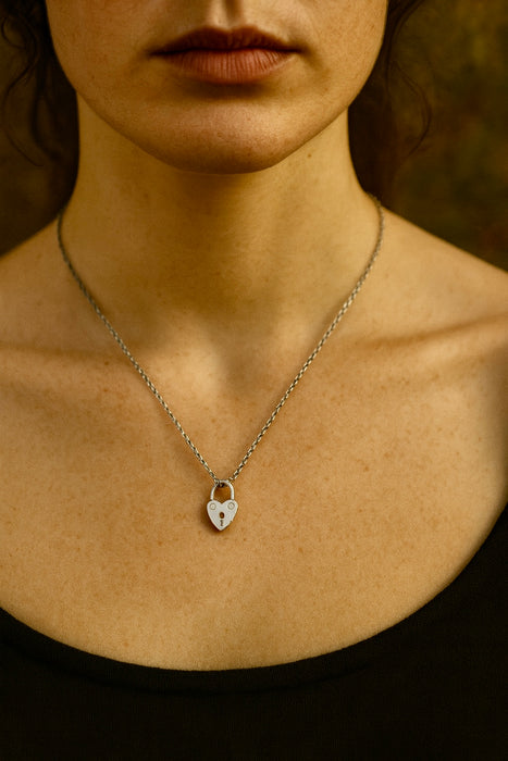 Polly, Victorian solid silver heart charm on a 40s silver chain