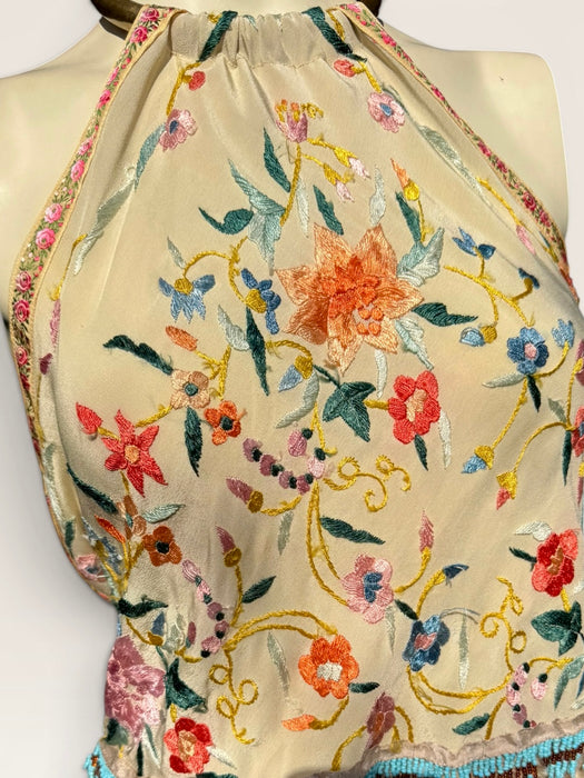 Kali, reworked embroidered piano shawl dress with brass choker and 20s sheered metallic skirt
