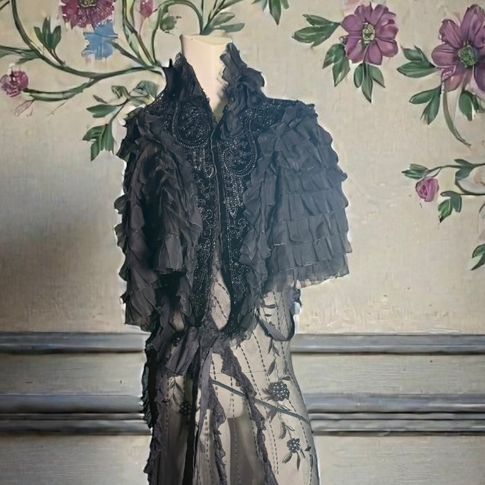 Elma, Victorian black silk ruffled cape with velour jet beaded collar