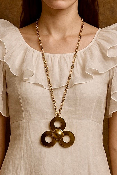 Paula, 70s geometric gold plated metal pendant