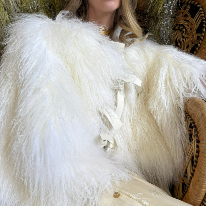 Magnolia, 80s Mongolian fur cream cape with 3 leather ties