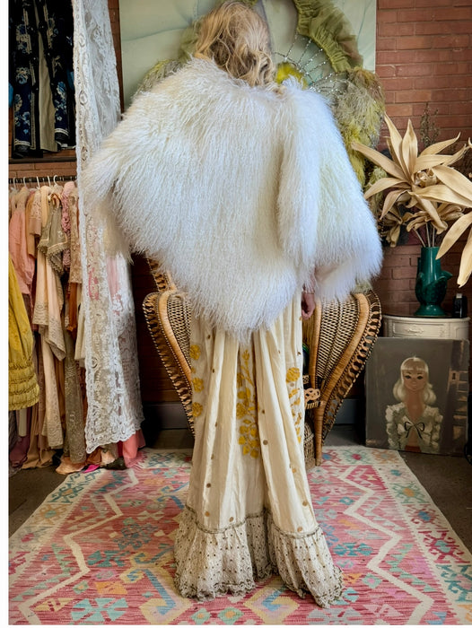Magnolia, 80s Mongolian fur cream cape with 3 leather ties