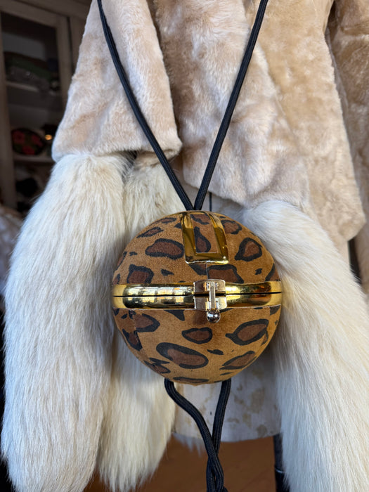 Raid, 70s circular leopard print tassel bag