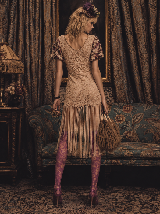 Odette, reworked 1940s cream lace fringed mini dress with 20s black jet beaded keyhole design.