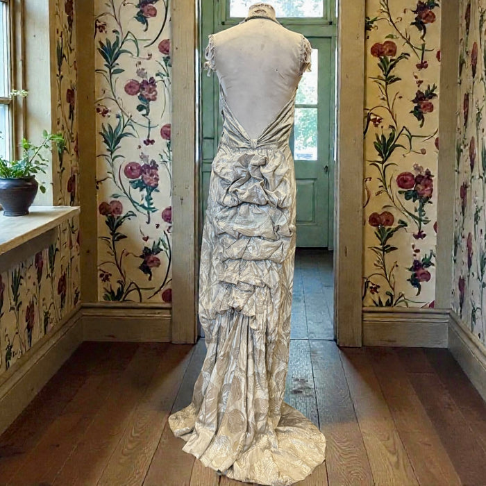 Monica, 20s silver floral lamé dress with bustle train
