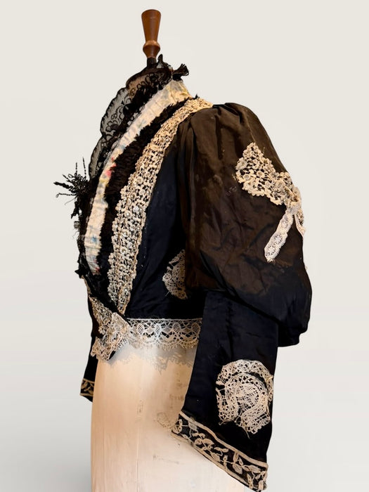Kiki, Victorian black silk jacket with mutton sleeves, embellished with beaded lace