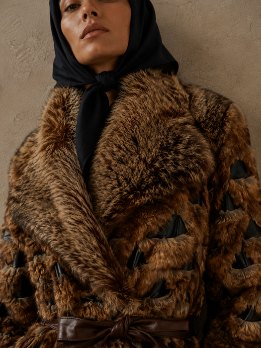 Macy’s 70s mixed leather and fur trench coat