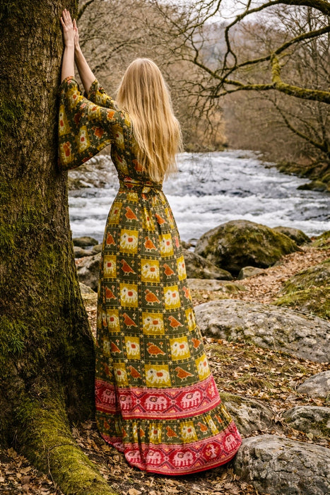 Thea Porter, Couture 70s silk print angel sleeve tiered dress